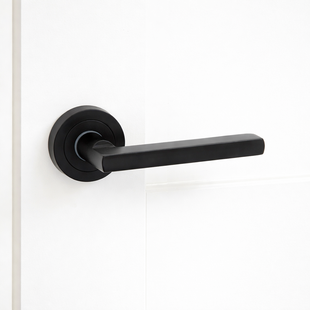 Türklinke Modell Rental 530 aus Aluminium mit runder Rosette in Schwarz für Türen